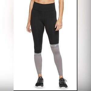 Nike One Women’s 7/8 Colorblock Leggings in Black/Gunsmoke. Size S